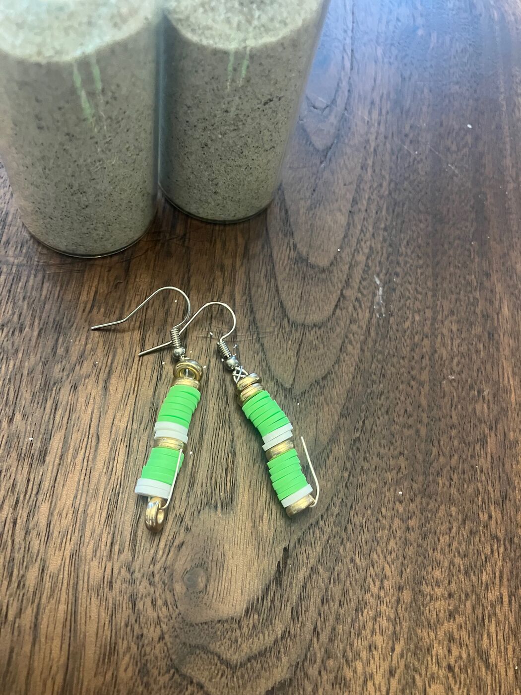 Green and white beaded earrings